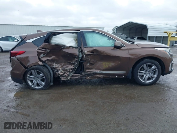 2019 Acura RDX w/Advance Pkg with VIN 5J8TC2H75KL017199, listed as a IAAI auction lot 41565130 with 67,880 mi miles. Bid and sale history available at carsss.com. Image 13.