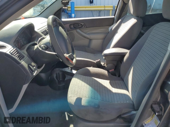 2007 Ford Focus S z VIN 1FAHP34N77W192231, wystawiony jako Copart lot #59020505 z przebiegiem 99 284 mil mil oraz Szkoda całkowita • Salvage title. Historia ofert i sprzedaży dostępna na DreamBid. Obrazek 7.