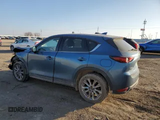 2020 Mazda CX-5 Grand Touring with VIN JM3KFBDM1L0727482, listed as a Copart auction lot 82976114 with 103,707 mi miles and Salvage Title. Bid and sale history available at carsss.com. Image 2.