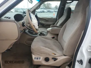 1997 Ford Expedition XLT with VIN 1FMEU17L5VLB80125, listed as a Copart auction lot 83892824 with 257,738 mi miles and Salvage title. Bid and sale history available at DreamBid. Image 7.