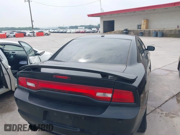 2014 Dodge Charger RT z VIN 2C3CDXCT2EH123810, wystawiony jako IAAI lot #42284705 z przebiegiem 171 159 mil mil oraz . Historia ofert i sprzedaży dostępna na DreamBid. Obrazek 16.