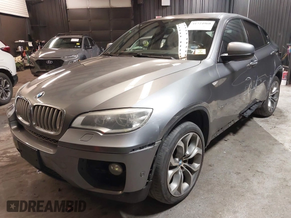 2014 BMW X6 50i z VIN 5UXFG8C55EL592995, wystawiony jako IAAI lot #41724960 z przebiegiem 137 112 mil mil oraz . Historia ofert i sprzedaży dostępna na DreamBid. Obrazek 2.