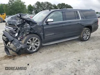 2015 Chevrolet Suburban LTZ with VIN 1GNSKKKC5FR147187, listed as a Copart auction lot 56767035 with 238,233 mi miles and Salvage title. Bid and sale history available at DreamBid. Image 1.
