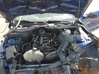 2022 Ford Mustang EcoBoost z VIN 1FATP8UH4N5102828, wystawiony jako IAAI lot #42073571 z przebiegiem 69 931 mil mil oraz . Historia ofert i sprzedaży dostępna na DreamBid. Obrazek 10.