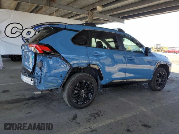 2022 Toyota RAV4 Hybrid SE with VIN 4T3T6RFV7NU103423, listed as a Copart auction lot 59709215 with 27,595 mi miles and Salvage title. Bid and sale history available at DreamBid. Image 3.