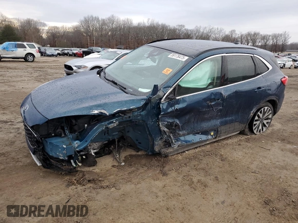 2020 Ford Escape Titanium z VIN 1FMCU9J91LUA73891, wystawiony jako Copart lot #89178475 z przebiegiem 35 579 mil mil oraz Szkoda całkowita • Salvage title. Historia ofert i sprzedaży dostępna na DreamBid. Obrazek 1.