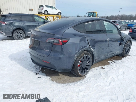 2023 Tesla Model Y Performance with VIN 7SAYGDEF0PF898181, listed as a IAAI auction lot 41577666 with 19,051 mi miles and . Bid and sale history available at DreamBid. Image 4.