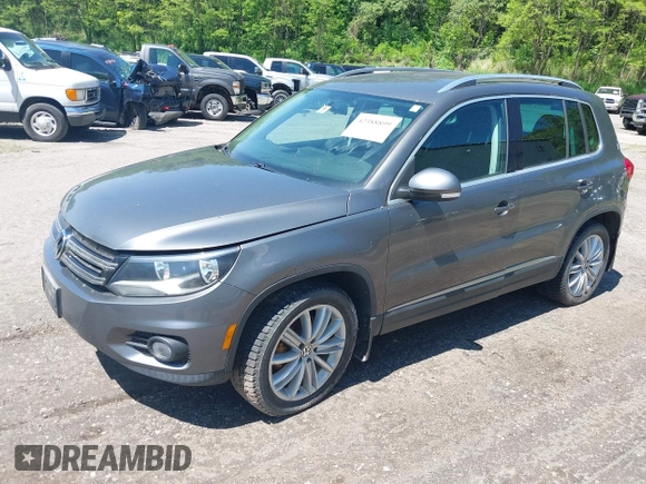 2013 Volkswagen Tiguan SE z VIN WVGBV7AX1DW006709, wystawiony jako IAAI lot #42388899 z przebiegiem 150 903 mil mil oraz . Historia ofert i sprzedaży dostępna na DreamBid. Obrazek 2.