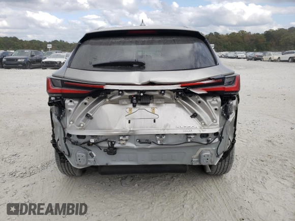 2023 Lexus NX with VIN 2T2GKCEZ8PC010465, listed as a Copart auction lot 77894374 with 18,269 mi miles and Salvage Title. Bid and sale history available at carsss.com. Image 6.