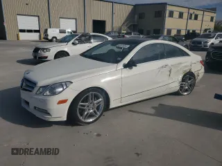 2011 Mercedes-Benz E-Class E 350 with VIN WDDKJ5GB2BF107776, listed as a Copart auction lot 82574914 with 64,209 mi miles and Salvage Title. Bid and sale history available at carsss.com. Image 1.