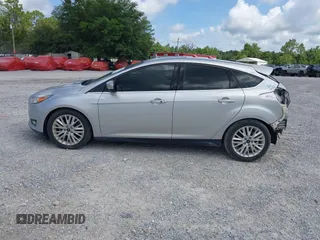 2018 Ford Focus Titanium with VIN 1FADP3N29JL232336, listed as a IAAI auction lot 42485243 with 82,113 mi miles and . Bid and sale history available at DreamBid. Image 14.