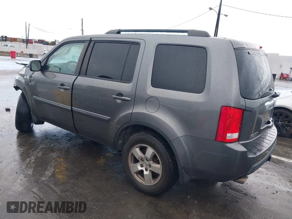 2011 Honda Pilot EX with VIN 5FNYF3H49BB026174, listed as a IAAI auction lot 41795460 with 201,488 mi miles and . Bid and sale history available at carsss.com. Image 3.