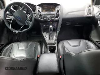 2015 Ford Focus Titanium z VIN 1FADP3N2XFL357224, wystawiony jako Copart lot #55626575 z przebiegiem 159 422 mil mil oraz Szkoda całkowita • Salvage title. Historia ofert i sprzedaży dostępna na DreamBid. Obrazek 8.