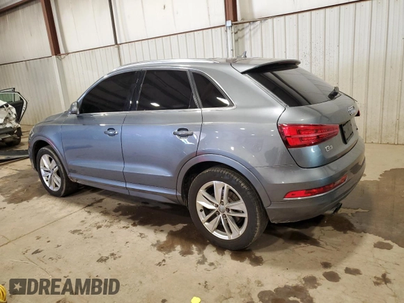 2016 Audi Q3 Premium Plus with VIN WA1EFCFS9GR001016, listed as a Copart auction lot 52300205 with 42,518 mi miles and Salvage Title. Bid and sale history available at carsss.com. Image 2.