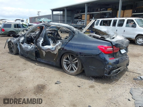 2017 BMW 7 Series 750i with VIN WBA7F0C34HGM21898, listed as a IAAI auction lot 39554484 with Not Provided miles and . Bid and sale history available at carsss.com. Image 3.