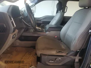 2015 Ford F-150 XLT with VIN 1FTEW1EF0FFA69722, listed as a Copart auction lot 59671695 with 189,690 mi miles and Salvage title. Bid and sale history available at DreamBid. Image 7.