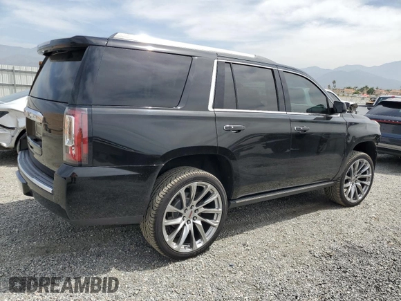2015 GMC Yukon Denali z VIN 1GKS2CKJ9FR609462, wystawiony jako Copart lot #56685575 z przebiegiem 125 679 mil mil oraz Szkoda całkowita • Salvage title. Historia ofert i sprzedaży dostępna na DreamBid. Obrazek 3.