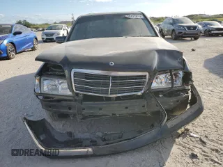 1998 Mercedes-Benz C 230/260/280/320 with VIN WDBHA23G8WA637787, listed as a Copart auction lot 88411815 with 207,843 mi miles and Salvage Title. Bid and sale history available at carsss.com. Image 5.