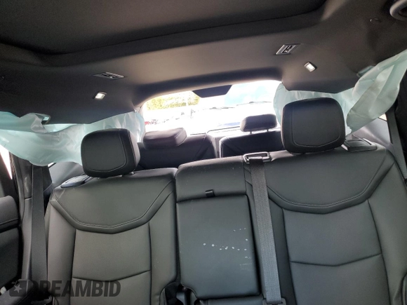 2024 Cadillac XT6 AWD Sport z VIN 1GYKPGRS6RZ749292, wystawiony jako Copart lot #50844795 z przebiegiem 12 972 mil mil oraz Szkoda całkowita • Salvage title. Historia ofert i sprzedaży dostępna na DreamBid. Obrazek 10.