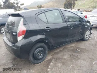 2016 Toyota Prius c One with VIN JTDKDTB36G1589422, listed as a IAAI auction lot 41883878 with 121,791 mi miles. Bid and sale history available at carsss.com. Image 4.
