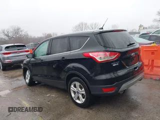 2014 Ford Escape SE with VIN 1FMCU0GX4EUE39511, listed as a IAAI auction lot 41477507 with 151,532 mi miles and . Bid and sale history available at DreamBid. Image 3.