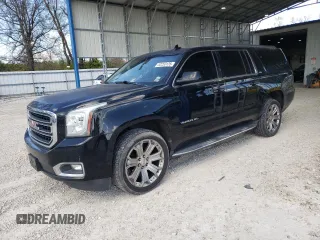 2016 GMC Yukon XL SLT with VIN 1GKS2GKC0GR223832, listed as a Copart auction lot 52250135 with 271,526 mi miles and Salvage Title. Bid and sale history available at carsss.com. Image 1.