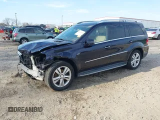 2012 Mercedes-Benz GL 350 with VIN 4JGBF2FE1CA768876, listed as a IAAI auction lot 41612274 with 104,718 mi miles and . Bid and sale history available at DreamBid. Image 2.