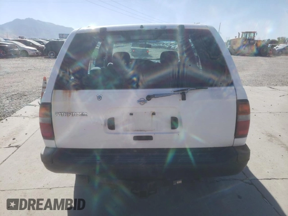 1996 Nissan Pathfinder XE z VIN JN8AR05Y6TW021708, wystawiony jako Copart lot #72991034 z przebiegiem 186 576 mil mil oraz Szkoda całkowita • Salvage title. Historia ofert i sprzedaży dostępna na DreamBid. Obrazek 6.