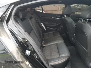 2023 Nissan Maxima SR with VIN 1N4AA6EV8PC506487, listed as a Copart auction lot 66585654 with 770 mi miles and Salvage title. Bid and sale history available at DreamBid. Image 10.