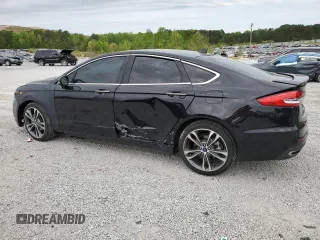 2019 Ford Fusion Titanium with VIN 3FA6P0D95KR184147, listed as a Copart auction lot 52968885 with 122,170 mi miles and Clean Title. Bid and sale history available at carsss.com. Image 2.
