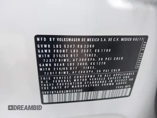 2018 Volkswagen Tiguan S with VIN 3VV1B7AX8JM032990, listed as a IAAI auction lot 42279807 with 74,185 mi miles and . Bid and sale history available at DreamBid. Image 9.