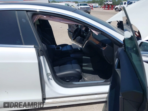 2020 Tesla Model S Performance with VIN 5YJSA1E49LF360655, listed as a IAAI auction lot 42777670 with Not provided miles and . Bid and sale history available at DreamBid. Image 5.