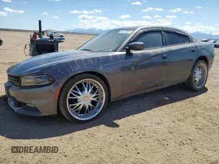 2015 Dodge Charger SXT z VIN 2C3CDXHG3FH800988, wystawiony jako Copart lot #54221905 z przebiegiem 134 098 mil mil oraz Szkoda całkowita • Salvage title. Historia ofert i sprzedaży dostępna na DreamBid. Obrazek 1.