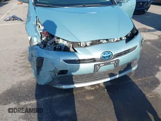 2022 Toyota Prius L Eco with VIN JTDKAMFU8N3188831, listed as a IAAI auction lot 42021222 with 39,629 mi miles and . Bid and sale history available at DreamBid. Image 6.
