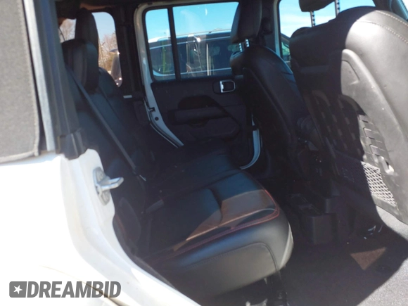 2023 Jeep Wrangler Rubicon with VIN 1C4HJXFG8PW655138, listed as a IAAI auction lot 41674959 with 40,790 mi miles and . Bid and sale history available at DreamBid. Image 8.