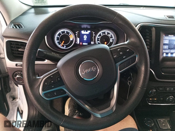 2021 Jeep Cherokee Latitude with VIN 1C4PJMCBXMD198312, listed as a IAAI auction lot 42737697 with 51,228 mi miles and . Bid and sale history available at DreamBid. Image 11.