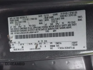 2014 Ford Escape SE with VIN 1FMCU9GX3EUB91417, listed as a IAAI auction lot 42009257 with 87,164 mi miles and . Bid and sale history available at DreamBid. Image 9.
