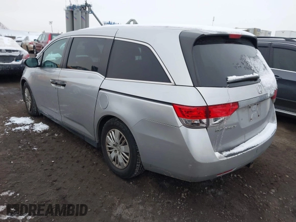 2014 Honda Odyssey LX with VIN 5FNRL5H22EB080346, listed as a IAAI auction lot 41282783 with 101,000 mi miles and . Bid and sale history available at carsss.com. Image 3.