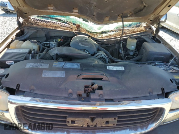 2002 GMC Sierra 1500HD SLE z VIN 1GTGK13U52F232896, wystawiony jako Copart lot #76999294 z przebiegiem Nie podano mil oraz Szkoda całkowita • Salvage title. Historia ofert i sprzedaży dostępna na DreamBid. Obrazek 11.