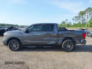 2021 Nissan Titan Pro-4X with VIN 1N6AA1ED0MN518084, listed as a IAAI auction lot 42147230 with 41,496 mi miles and . Bid and sale history available at DreamBid. Image 14.