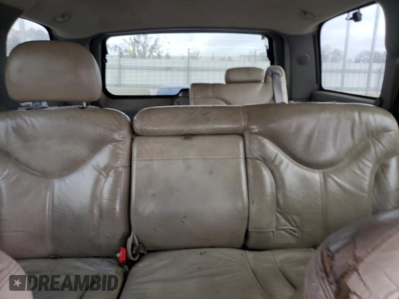 2001 GMC Yukon SLT z VIN 1GKEC13T51J145673, wystawiony jako Copart lot #83568954 z przebiegiem 310 415 mil mil oraz Szkoda całkowita • Salvage title. Historia ofert i sprzedaży dostępna na DreamBid. Obrazek 10.
