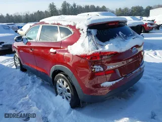 2019 Hyundai Tucson SE with VIN KM8J2CA44KU981393, listed as a IAAI auction lot 41455334 with 98,318 mi miles. Bid and sale history available at carsss.com. Image 3.