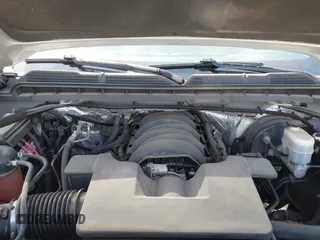 2016 Chevrolet Silverado 1500 LT with VIN 1GCVKREC4GZ125676, listed as a IAAI auction lot 42006237 with 114,699 mi miles. Bid and sale history available at carsss.com. Image 10.