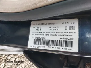 2002 Chrysler 300M M z VIN 2C3AE76K52H311224, wystawiony jako IAAI lot #42219634 z przebiegiem 172 884 mil mil oraz . Historia ofert i sprzedaży dostępna na DreamBid. Obrazek 9.