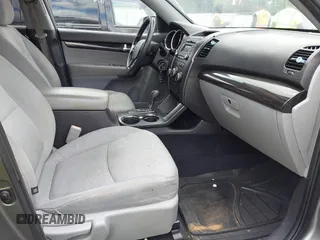 2012 Kia Sorento LX with VIN 5XYKT3A60CG285902, listed as a IAAI auction lot 42142043 with 225,206 mi miles and . Bid and sale history available at carsss.com. Image 5.