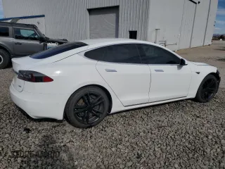 2016 Tesla Model S 90D with VIN 5YJSA1E27GF142380, listed as a Copart auction lot 50661905 with 104,865 mi miles and Salvage Title. Bid and sale history available at DreamBid. Image 3.