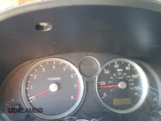 2005 Suzuki Aerio SX z VIN JS2RC61H155300393, wystawiony jako Copart lot #84177204 z przebiegiem Nie podano mil oraz Szkoda całkowita • Salvage title. Historia ofert i sprzedaży dostępna na DreamBid. Obrazek 9.