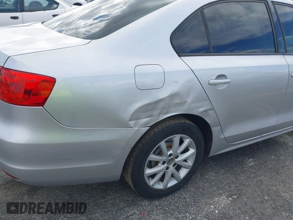 2012 Volkswagen Jetta Sedan SE w/Convenience PZEV with VIN 3VWDP7AJ5CM348310, listed as a IAAI auction lot 41439669 with 166,554 mi miles. Bid and sale history available at carsss.com. Image 6.