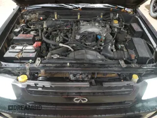2000 Infiniti QX4 z VIN JNRAR07Y6YW080306, wystawiony jako Copart lot #85022064 z przebiegiem 278 383 mil mil oraz Tytuł czysty. Historia ofert i sprzedaży dostępna na DreamBid. Obrazek 12.