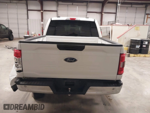 2021 Ford F-150 XL with VIN 1FTEW1C57MFA71572, listed as a IAAI auction lot 41549588 with 82,389 mi miles and . Bid and sale history available at carsss.com. Image 17.